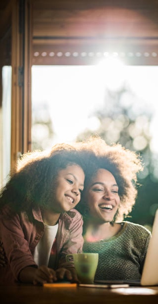 Mother and Daughter Smiling